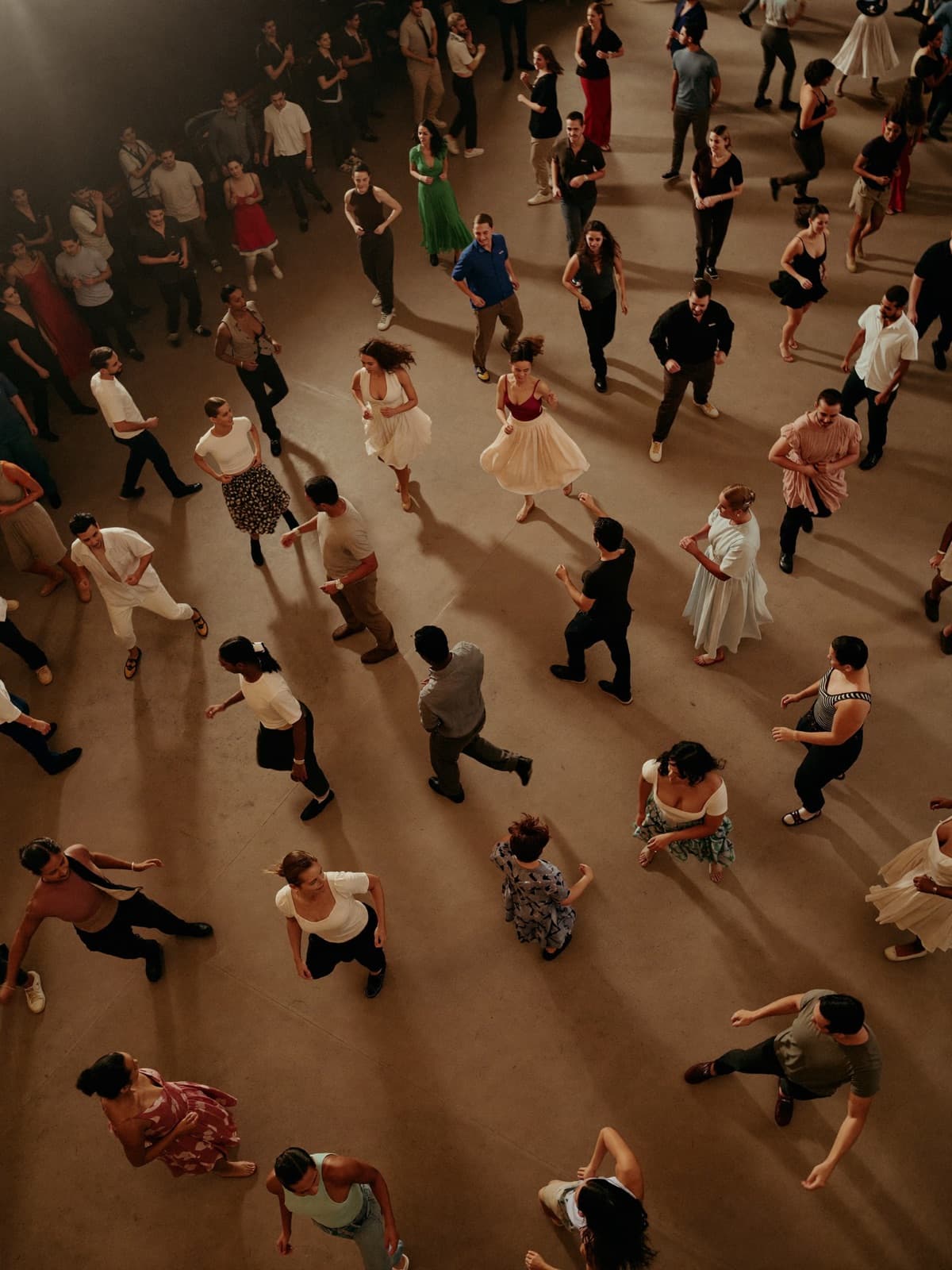 A crowded social dance floor seen from above
